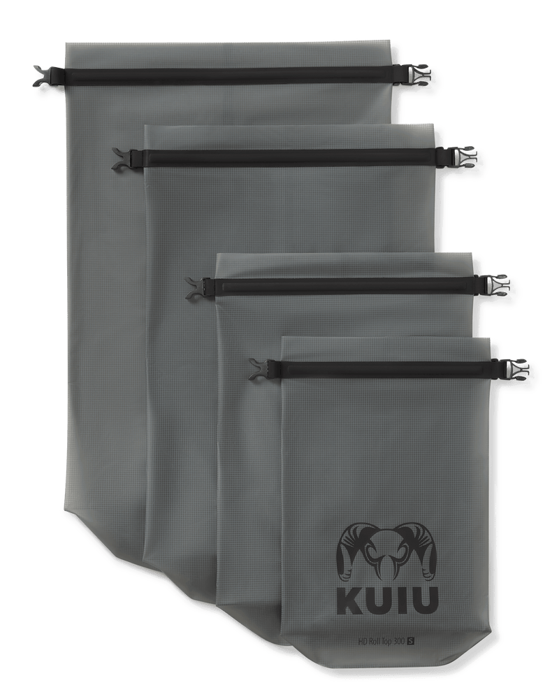 Picture of all four sizes of HD Roll Top Dry Bag in Stone Grey laid out flat