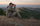 Professional hunting Guide Jake Franklin glassing with binoculars in KUIU camouflage