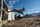 A bighorn sheep being released from a trailer on Antelope Island.