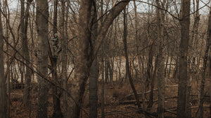White hunter in a treestand.