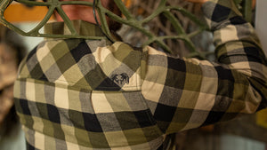 Man wearing the KUIU Field Flannel shirt.
