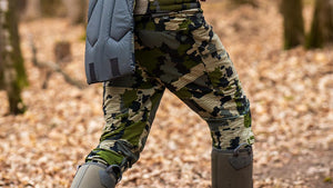 Turkey hunter wearing the Kutana Hybrid Pant in Verde Camouflage