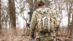Whitetail hunter wearing the Scout 000 Day Backpack
