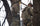 Back of Hunter Standing in Treestand Wearing Encounter Jacket in Valo Camouflage Highlighting Treestand Safety Harness Port