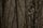 Front of Hunter Rattling Antlers in Treestand Wearing Proximity Insulated Jacket and Pants in Valo Camouflage