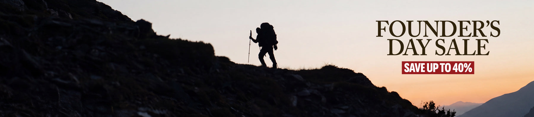 A promotional banner featuring a silhouetted hiker on a rocky mountain ridge against a sunset sky, with the text 'FOUNDER'S DAY SALE' and 'SAVE UP TO 40%' on the right.