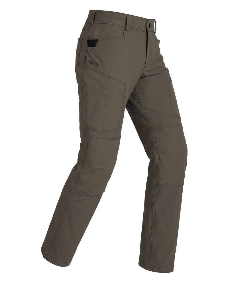 Angled pose highlighting shape and construction of Groundwork Woven Pant in Rodeo brown