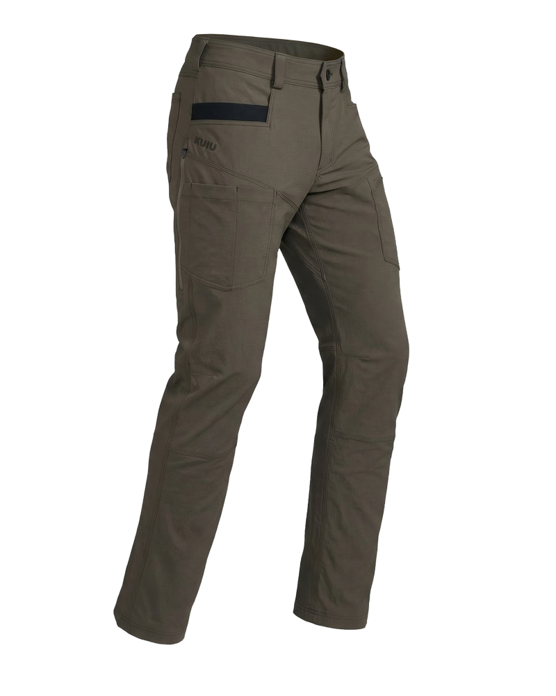 Angled pose highlighting shape and construction of Motive Workgrade Pant in Rodeo Brown