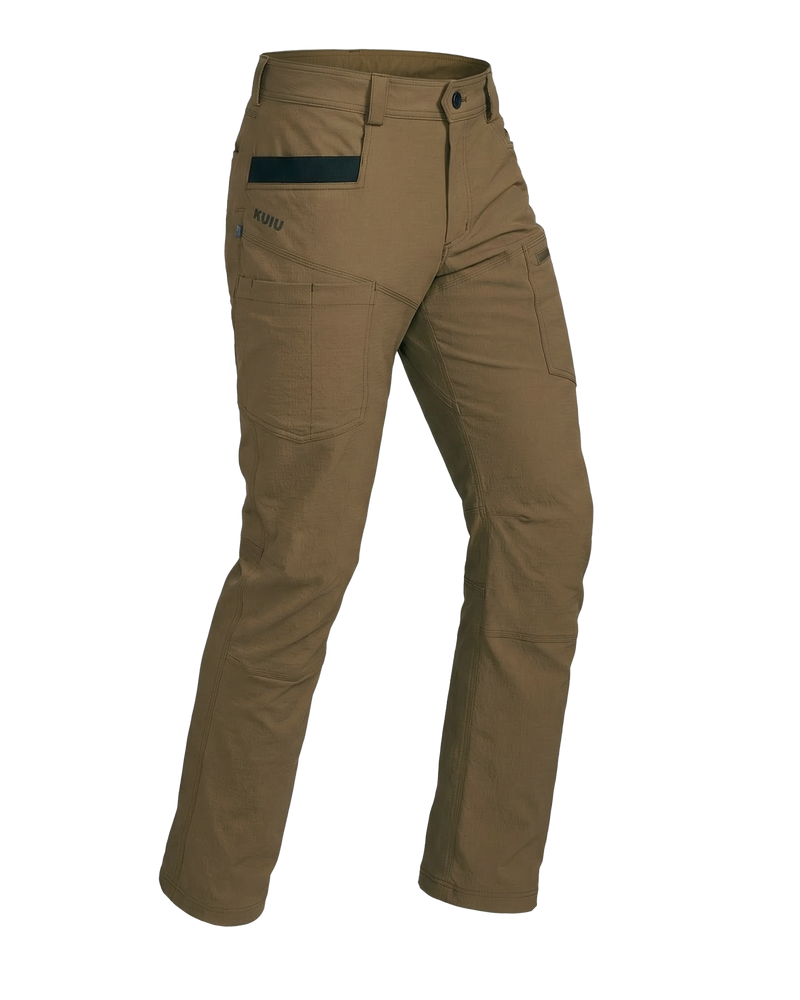 Angled pose highlighting shape and construction of Motive Workgrade Pant in Tobacco Brown