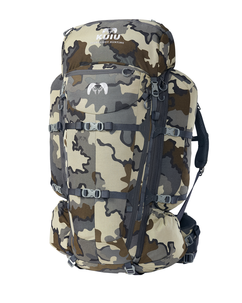 Front of PRO 6000 Pack Full Kit in Vias Camouflage with suspension, carbon fiber frame and a detachable compression lid