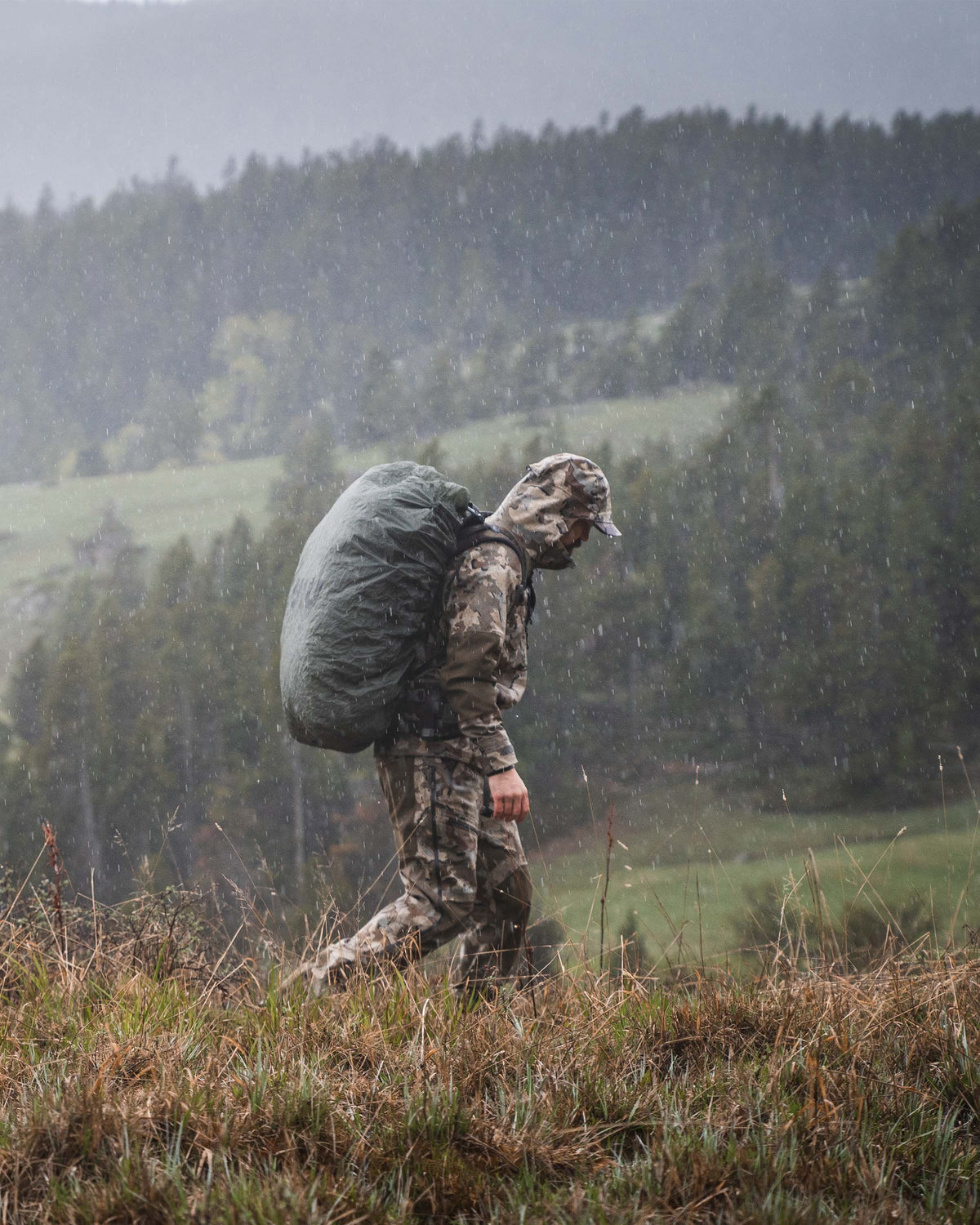 camouflage rain gear KUIU Yukon TR Rain Hunting Jacket in Verde