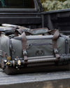 Distance Duffel in Truck Bed with tripod attached in Gunmetal