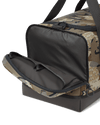 Distance Duffel with left side pocket zipped open showing two additional organization areas in Valo Camouflage