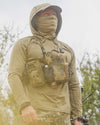 Hunter wearing Gila PRO LS Hoodie in Khaki using hood and built-in neck gaiter