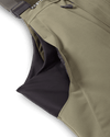 Stretch side paneling and Sherpa fleece-lined hand pockets on the KUIU Paragon Storm Shell Bib for waterfowl hunting