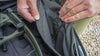 Close-up of built-in removable bow sleeve in the Waypoint 10000 Roller in Asphalt Grey