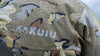 Detailed View of Hunter Wearing Chugach TR Rain Jacket in Valo Camouflage Highlighting K-DWR Treatment to Repel Water