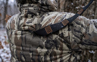 Treestand safety harness port on the KUIU Proximity Hooded Insulated Jacket in Veros Camouflage
