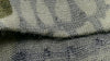 Close up detailed image of the fabric weave on a ULTRA Merino 145 Zip T Hunting Shirt in verde camouflage