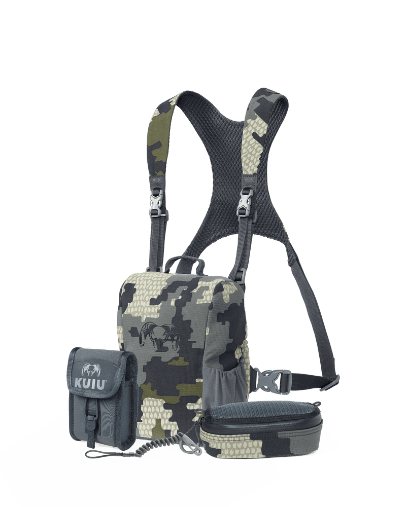 Image showing the available accessories for the PRO Bino Harness in Verde camouflage including  the rangefinder holder 2.0 in steel grey, rangefinder lanyard, and bino harness accessory pocket in Verde Camouflage