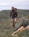Hunter in the field wearing a full Valo kit including the Peloton 240 Full Zip in Valo Camouflage